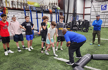 The Kansas City Athlete Training Defensive Back Training Class is part of our Kansas City Athlete Training Football Academy classes. This class focuses on the techniques needed to play any and all of the Defensive Back positions on the football field including corners and safeties. Our veteran Defensive Back instructors lead by John Randle and Todd Harvey work on backpedal, pass drops, defending a wide-receiver, proper drop angles, footwork and talk strategy. This class is highly recommended for not only Defensive Backs (corners and safeties) but also for Linebackers to help with their pass coverage.